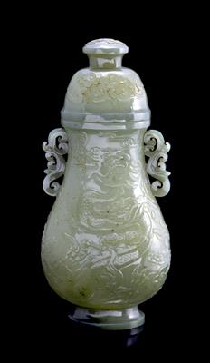 Lot 263 - A jade two handled vase and cover