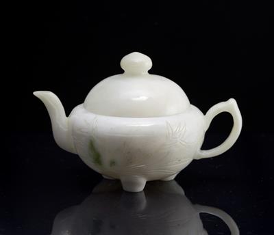 Lot 273 - A Chinese white jade teapot and cover