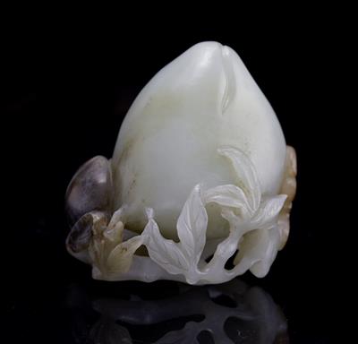 Lot 288 - A Chinese white and russet jade carving