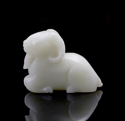 Lot 292 - A Chinese greenish-white jade model