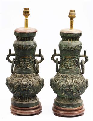 Lot 312 - A pair of Chinese archaic style bronze table lamps