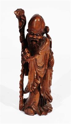 Lot 313 - A Chinese carved hardwood model of Shou Lao