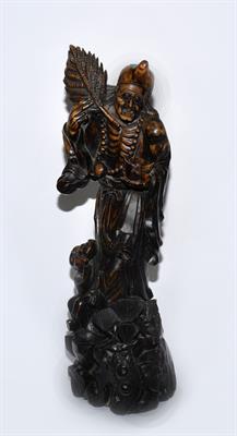 Lot 316 - A Chinese carved wood deity