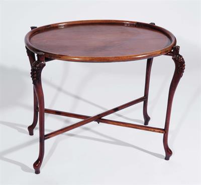 Lot 384 - A Chinese hardwood plain oval occasional table