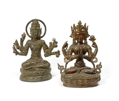 Lot 401 - A Sino-Tibetan bronze seated multi-armed deity