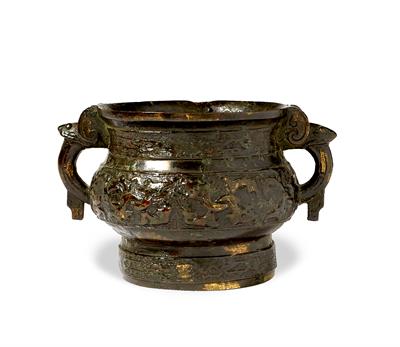 Lot 405 - A Chinese bronze two handled ding