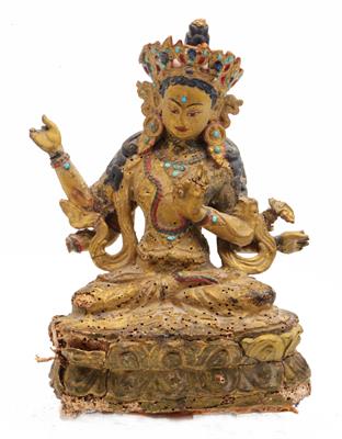 Lot 411 - A Tibetan papier mache figure of Amoghasiddhi