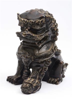 Lot 415 - A Chinese bronze temple dog