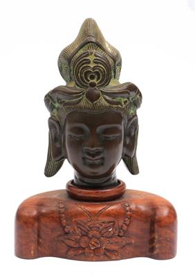 Lot 416 - A Chinese bronze head of Quanyin