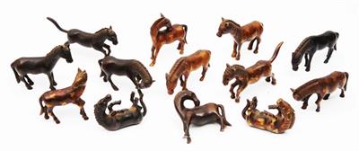 Lot 417 - Two groups of Chinese bronze miniature model horses