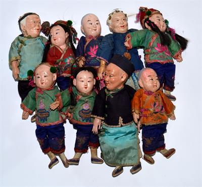 Lot 420 - A collection of nine Chinese dolls