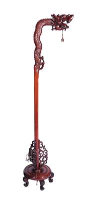 Lot 450 - A Chinese hardwood lamp standard