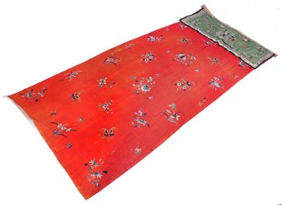 Lot 468 - A Chinese red ground silk hanging panel