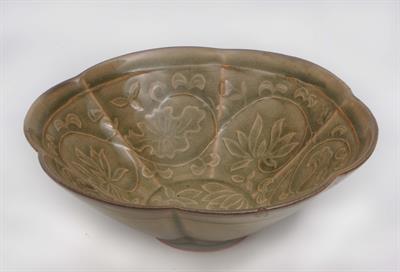 Lot 483 - A Chinese celadon lobed bowl