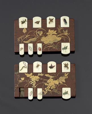 Lot 506 - A pair of Japanese wood and ivory card markers