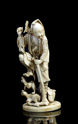 Lot 512 - A Japanese ivory okimono