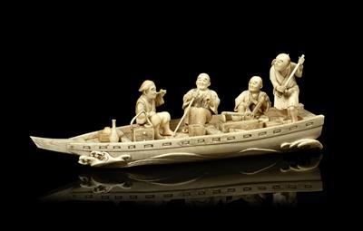 Lot 520 - A Japanese ivory okimono
