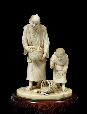 Lot 528 - A Japanese ivory okimono