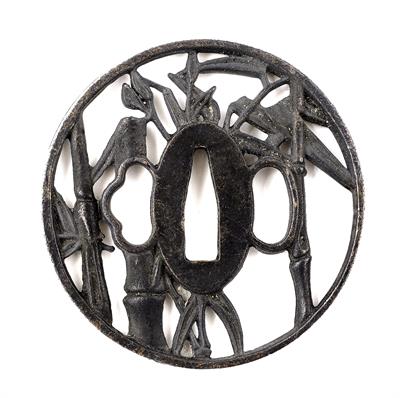 Lot 539 - A Japanese iron tsuba