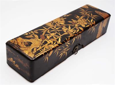 Lot 563 - A Japanese takamakie lacquer scroll box (Fubako)
