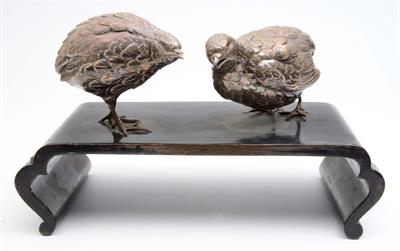 Lot 582 - A pair of Japanese silver models of quails