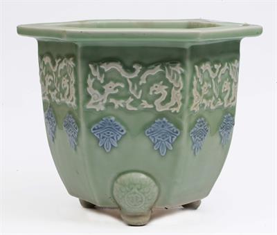 Lot 594 - A Japanese celadon hexagonal jardiniere