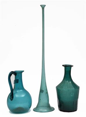 Lot 653 - A Persian green glass ewer