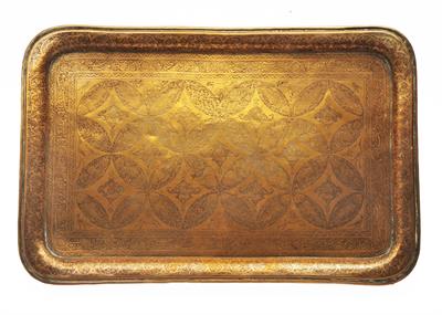 Lot 659 - A Persian brass rectangular tray