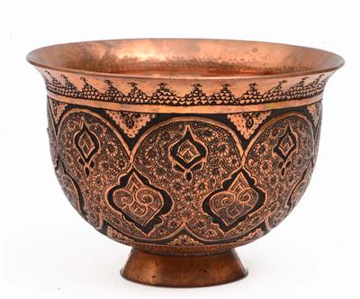 Lot 660 - A Persian copper bowl