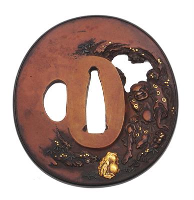 Lot 677 - A Japanese tsuba