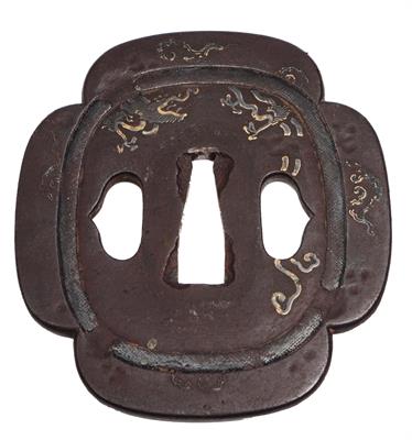 Lot 678 - A Japanese tsuba