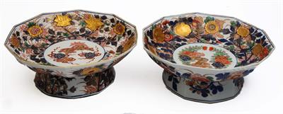 Lot 699 - A pair of Japanese Imari stands