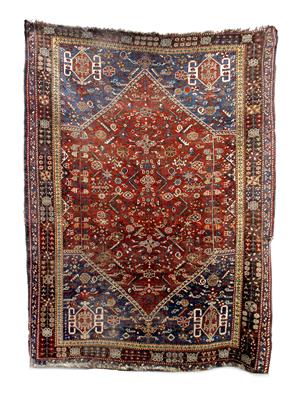 Lot 713 - A Baluch red ground rug