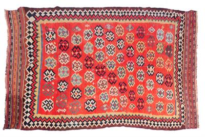 Lot 719 - A Kelim red ground small carpet