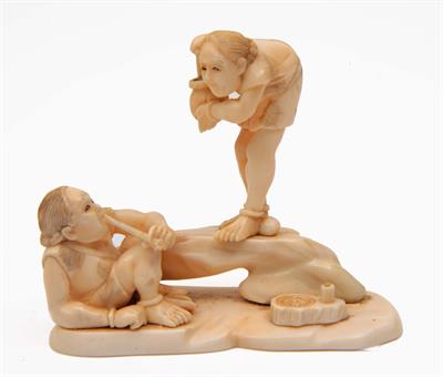 Lot 739 - A Japanese ivory okimono of two fishermen