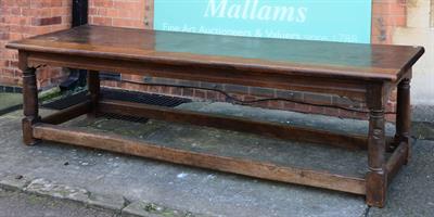 Lot 1 - A Georgian oak refectory style table