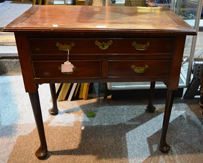 Lot 18 - A Georgian mahogany lowboy