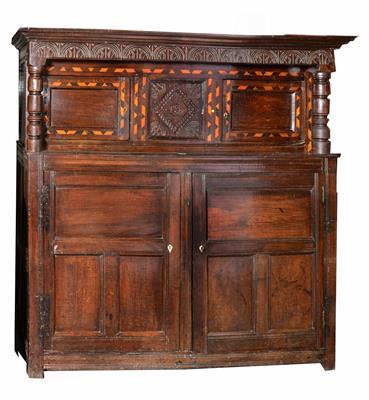 Lot 23 - A large Georgian oak court cupboard