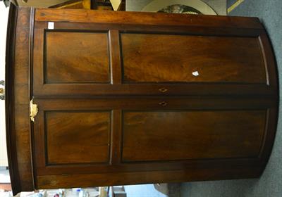 Lot 59 - A 19th Century mahogany bow front corner cupboard