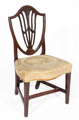 Lot 62 - A set of four George III dining chairs