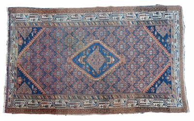 Lot 63 - A Baluch rust ground rug