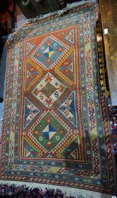 Lot 65 - A Pakistan red ground rug