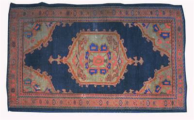 Lot 66 - A Caucasian blue ground rug