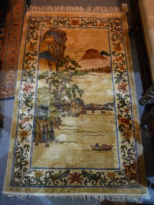 Lot 96 - A Chinese silk rug
