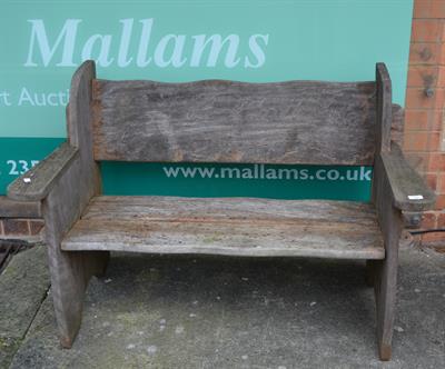 Lot 104 - A teak garden bench