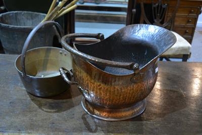 Lot 265 - A copper helmet shaped coal scuttle