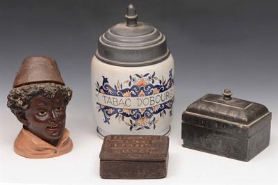 Lot 272 - A continental pottery tobacco jar