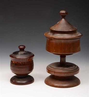 Lot 273 - A Victorian turned wood small tobacco jar and cover