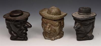 Lot 274 - Three Victorian cast iron tobacco jars