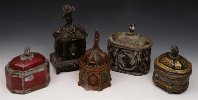 Lot 276 - A lead sarcophagus shaped tobacco jar and cover